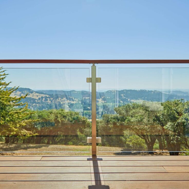 Sleek Wood Handrail with Glass Panels