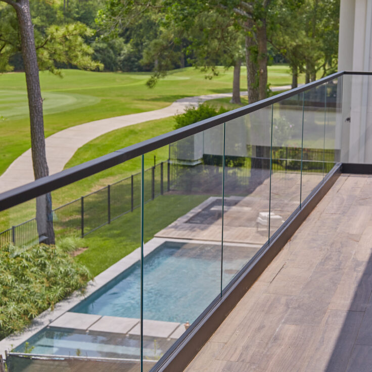 Glass and Black Base Rail on a Golf Course